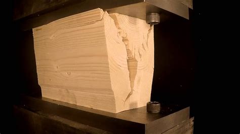 compression test on wooden block|Compression failure of a timber block perpendicular to the grain .